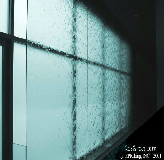 Glass water wall at Museum World Religion entrance